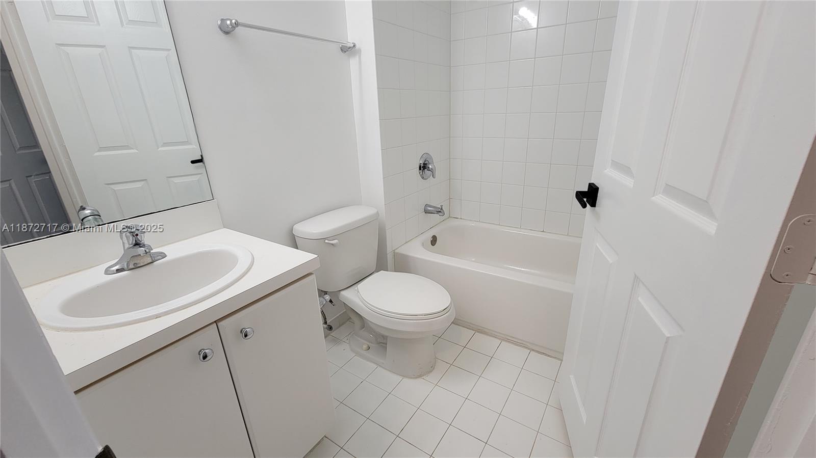 12600 Southwest 50th Court, Unit 437 Miramar, FL 33027 - Photo 18 of 28 a bathroom with a sink toilet and shower