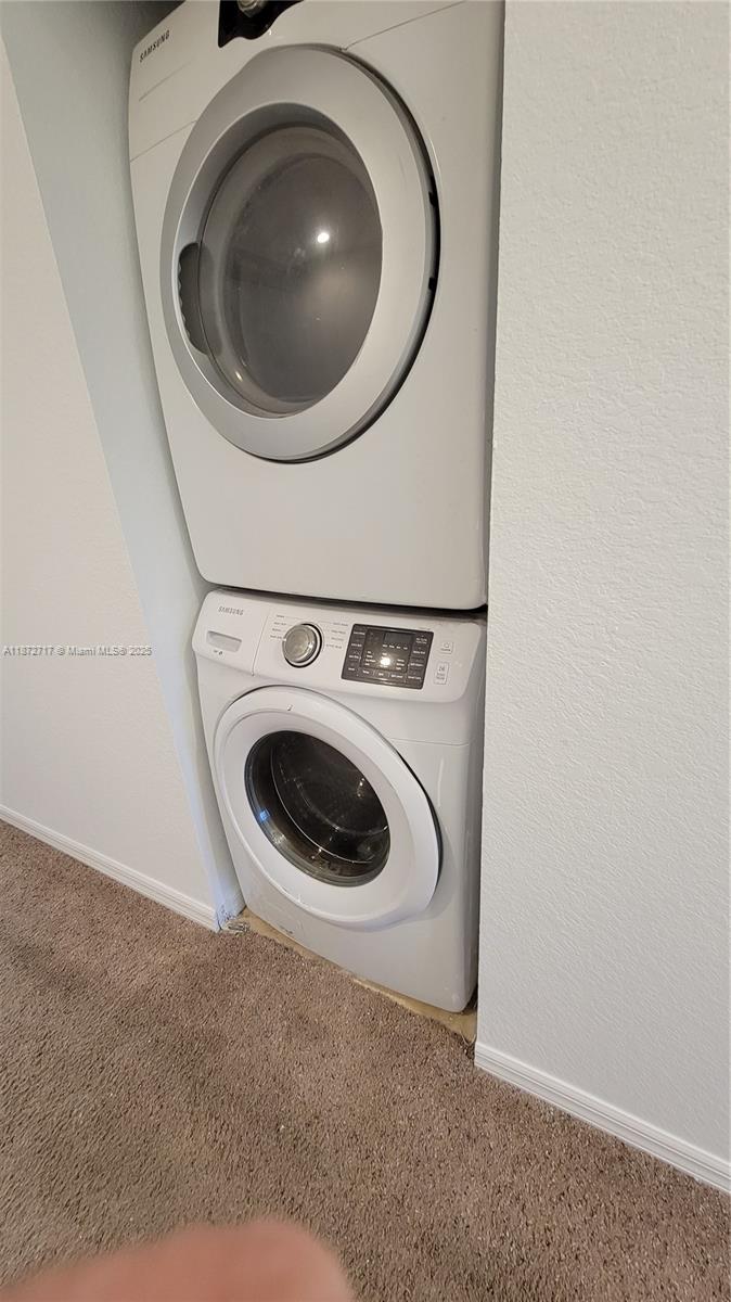 12600 Southwest 50th Court, Unit 437 Miramar, FL 33027 - Photo 20 of 28 a utility room with dryer and washer