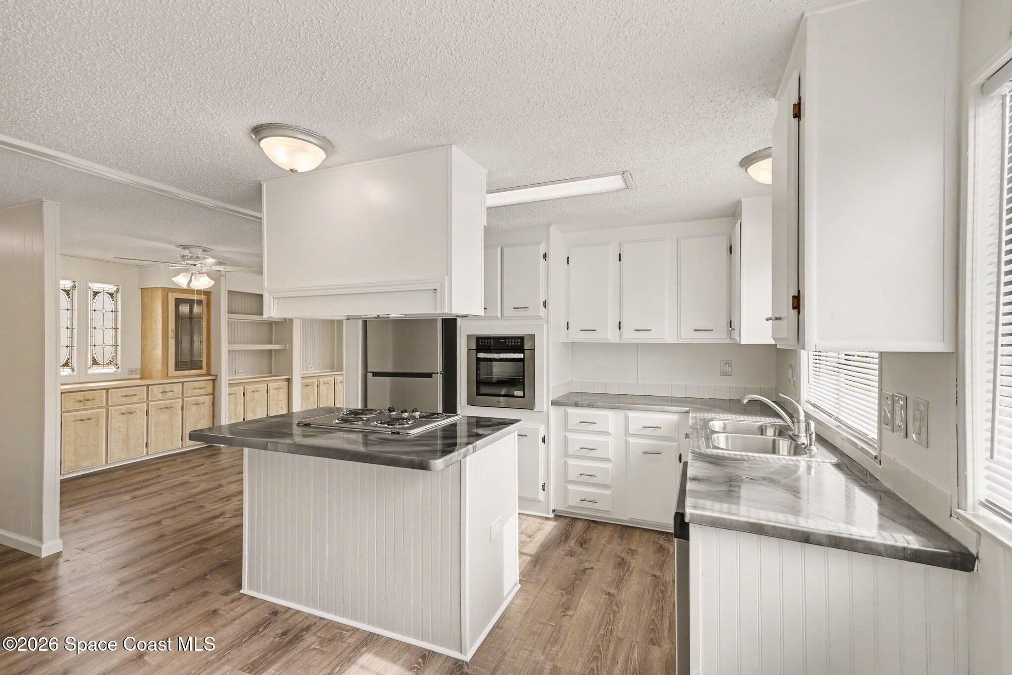604 Breezeway Drive Cocoa, FL 32926 - Photo 6 of 26 Updated kitchen with island