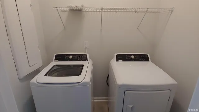 a utility room with dryer and washer
