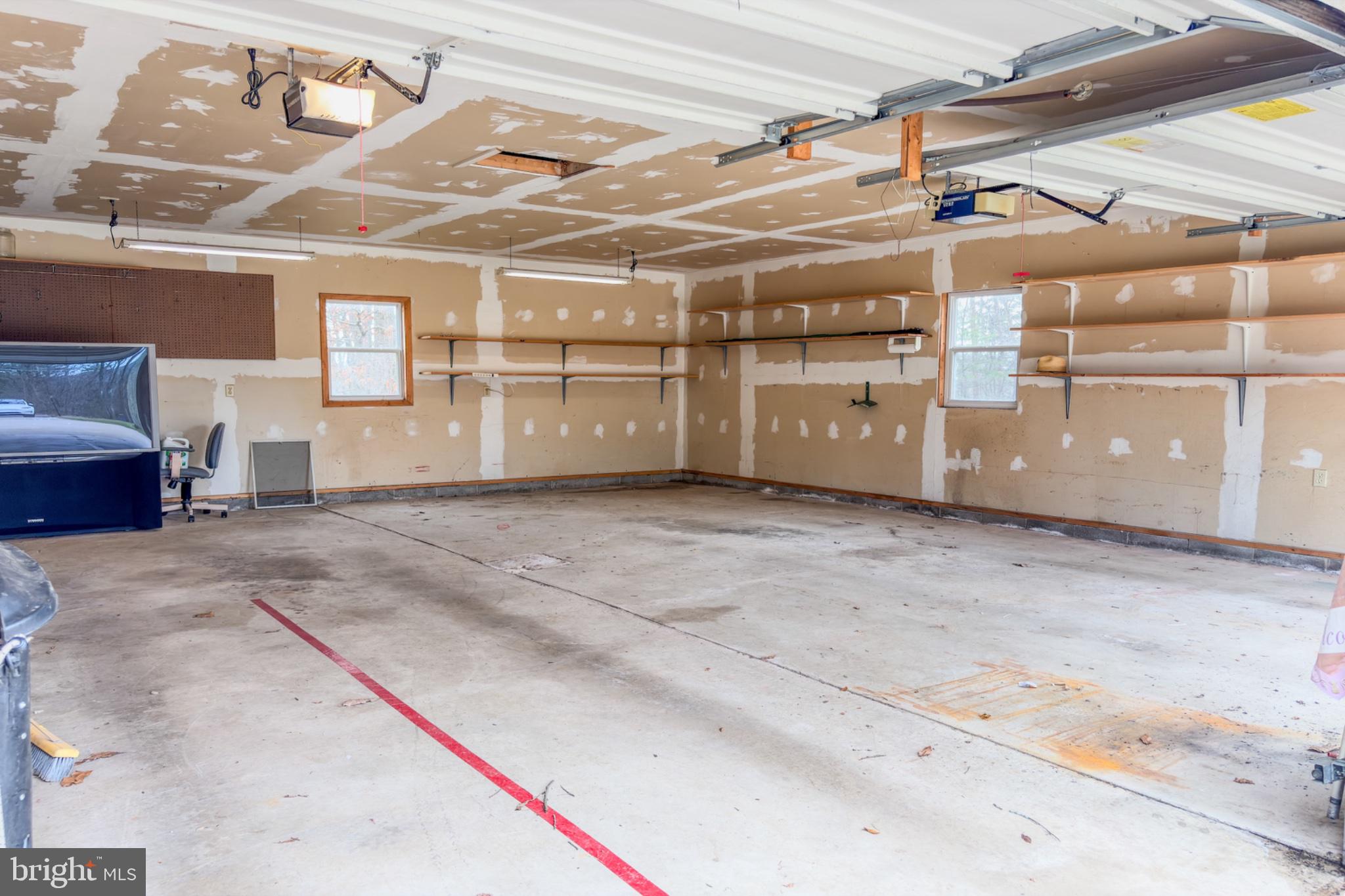 467 Swanger Road New Columbia, PA 17856 - Photo 36 of 45 Spacious garage with ample storage.