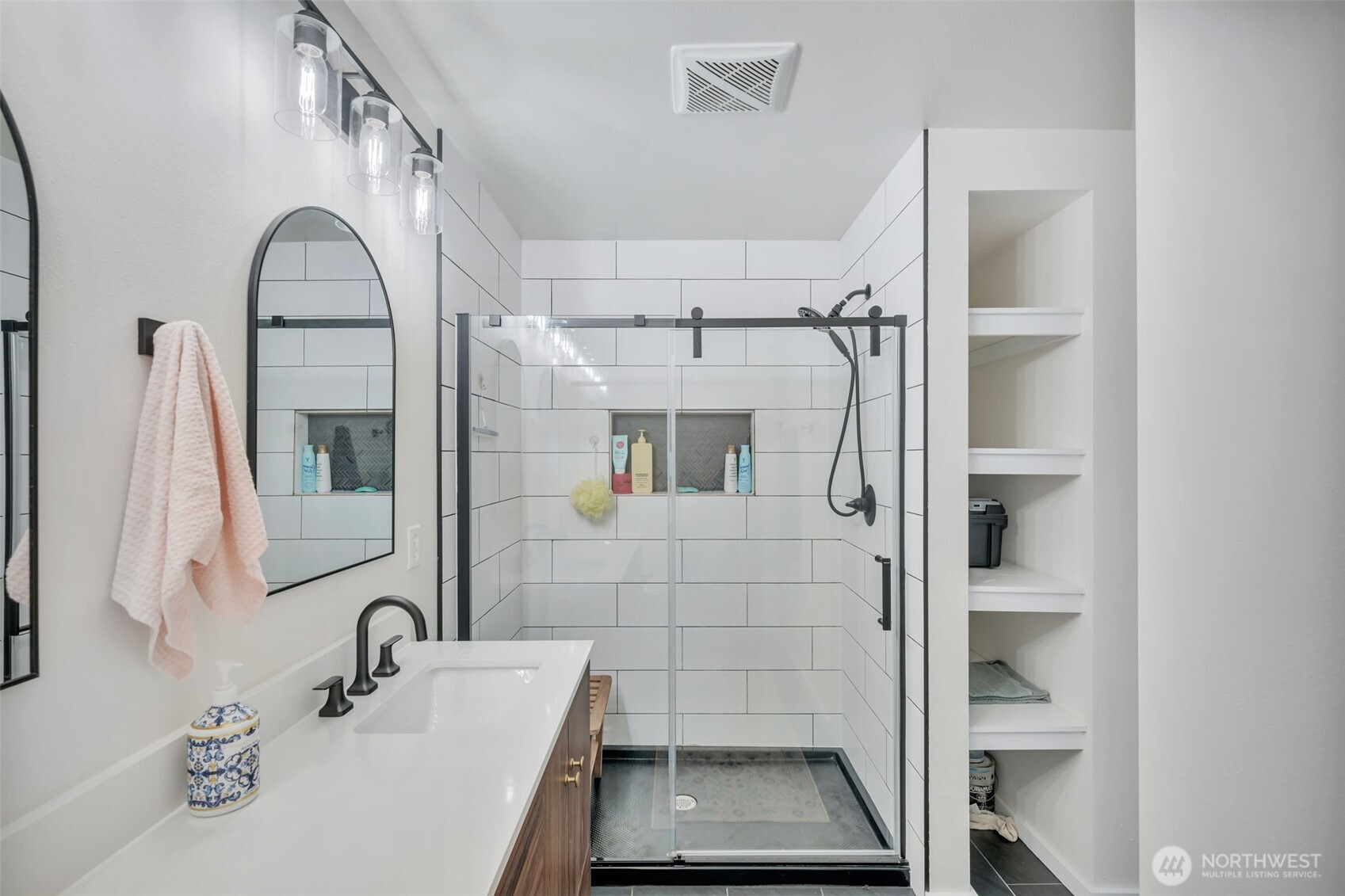 118 Morris Street Monroe, WA 98272 - Photo 21 of 35 a bathroom with a sink and a mirror