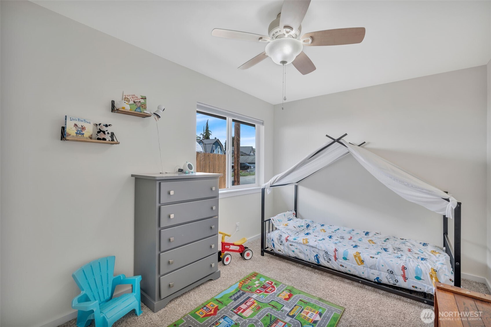 118 Morris Street Monroe, WA 98272 - Photo 23 of 35 a bedroom with furniture and a bed