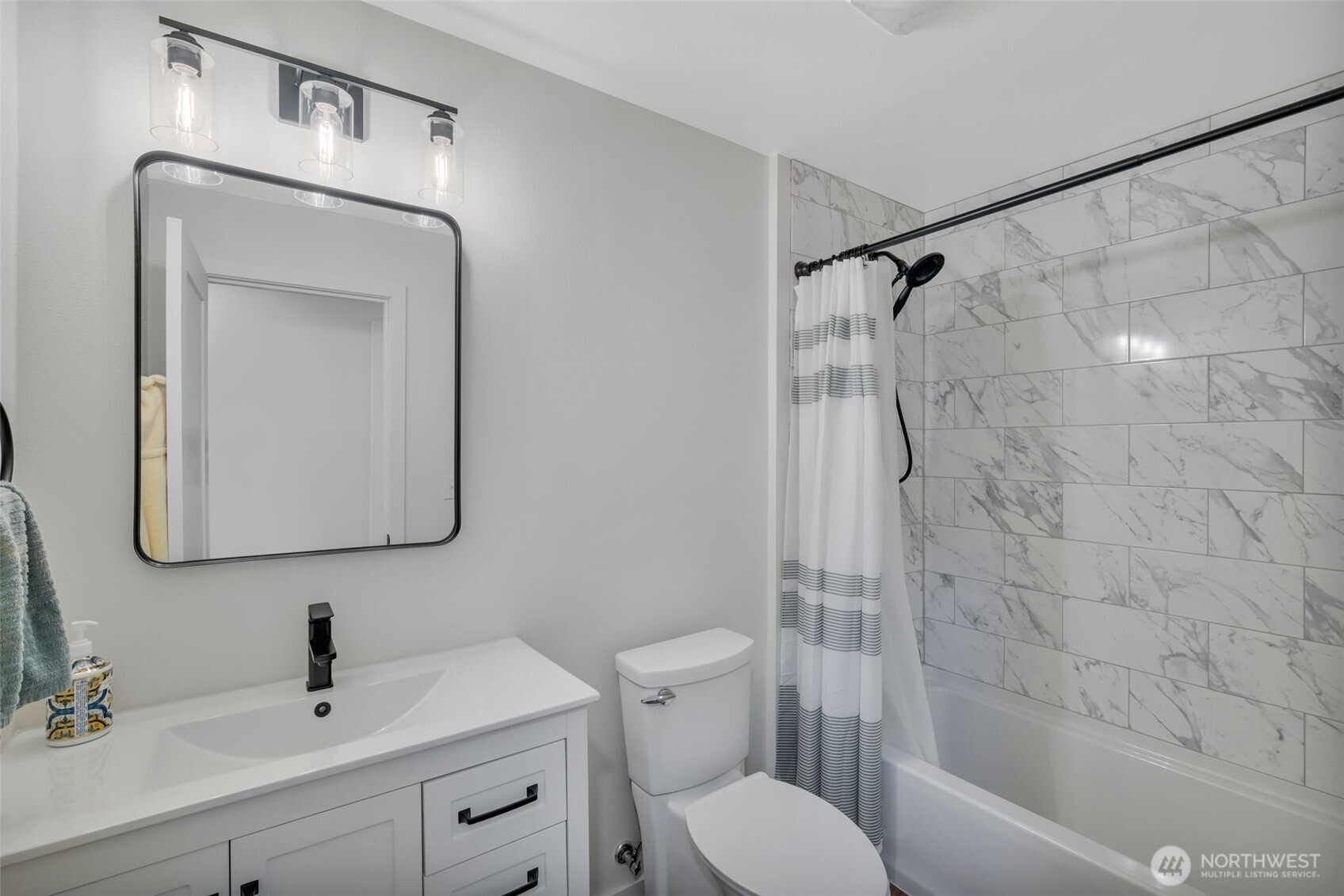 118 Morris Street Monroe, WA 98272 - Photo 24 of 35 a bathroom with a toilet sink and shower