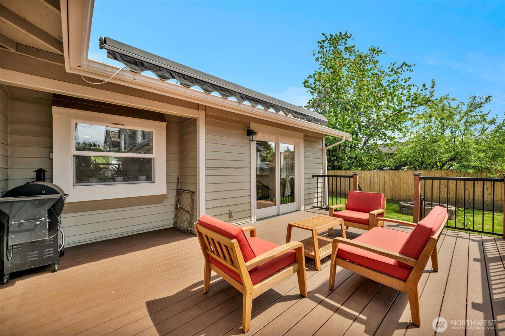118 Morris Street Monroe, WA 98272 - Photo 26 of 35 a view of a patio with a table and chairs