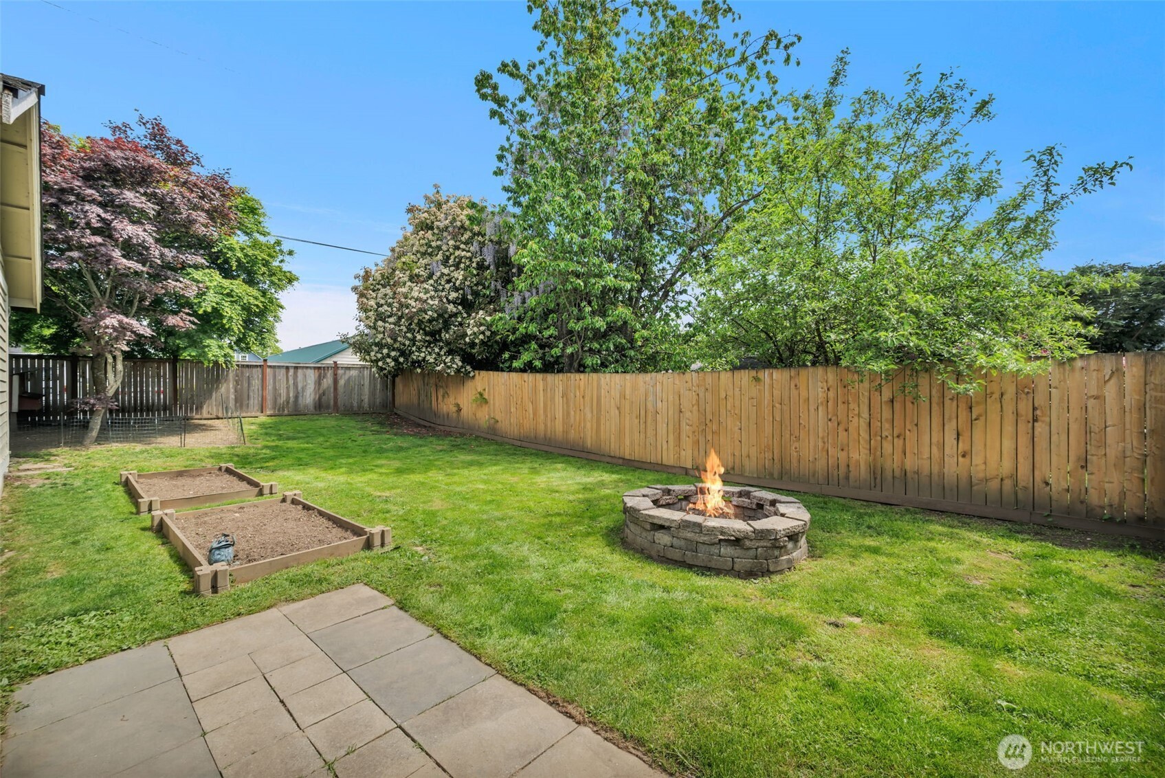 118 Morris Street Monroe, WA 98272 - Photo 28 of 35 a backyard of a house with table and chairs