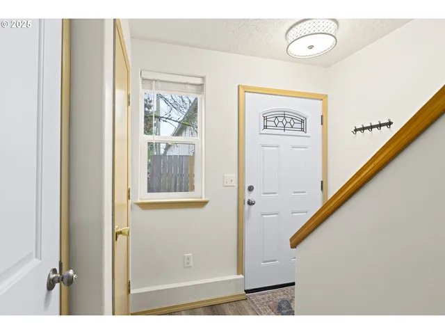 a view of a hallway with entryway