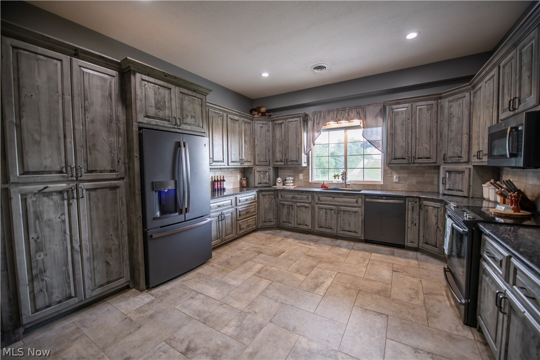 9918 Ridge Road Southeast Uhrichsville, OH 44683 - Photo 8 of 42 Abundant Cabinet Space