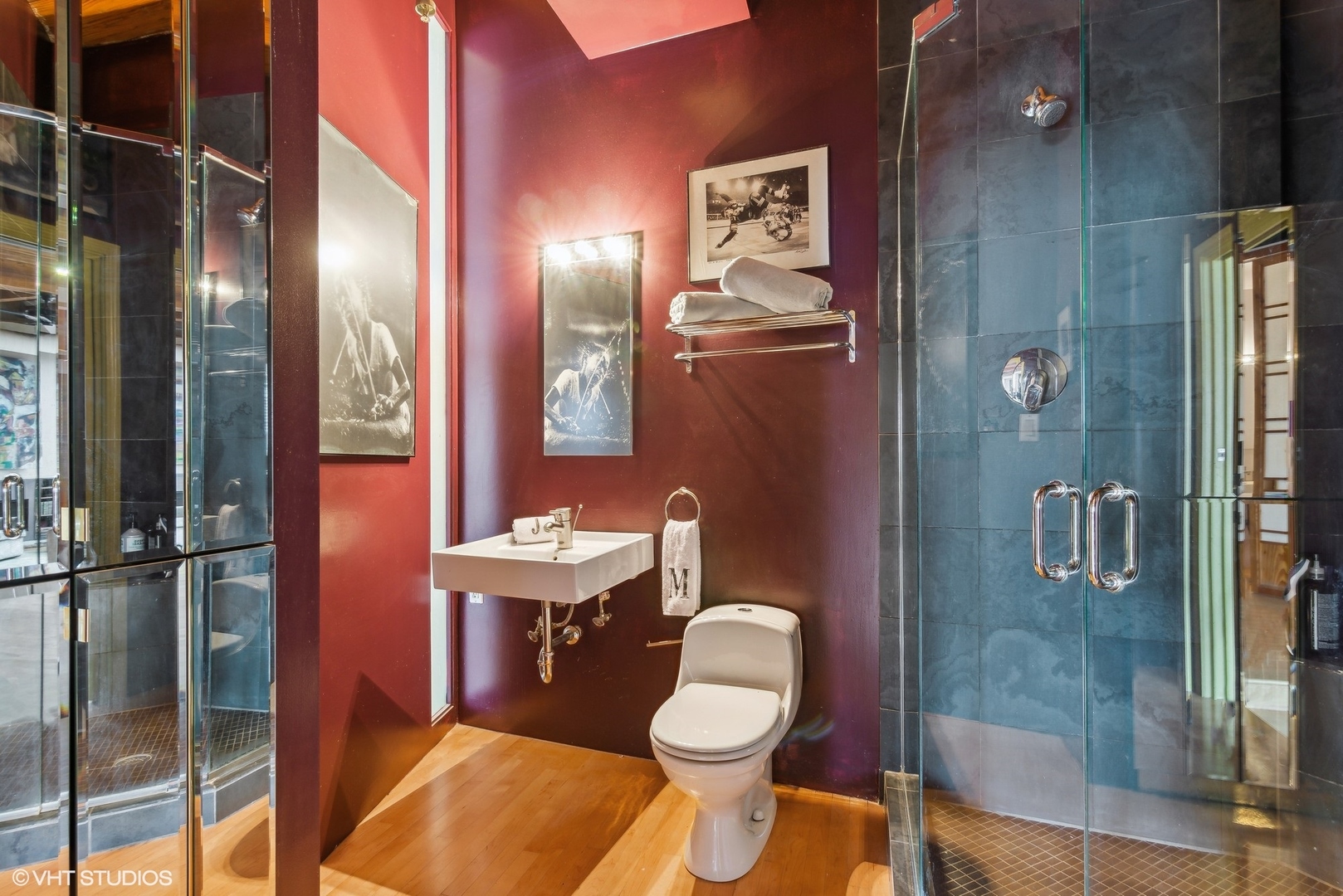 411 South Sangamon Street, Unit 8E Chicago, IL 60607 - Photo 21 of 25 a bathroom with a sink toilet and shower