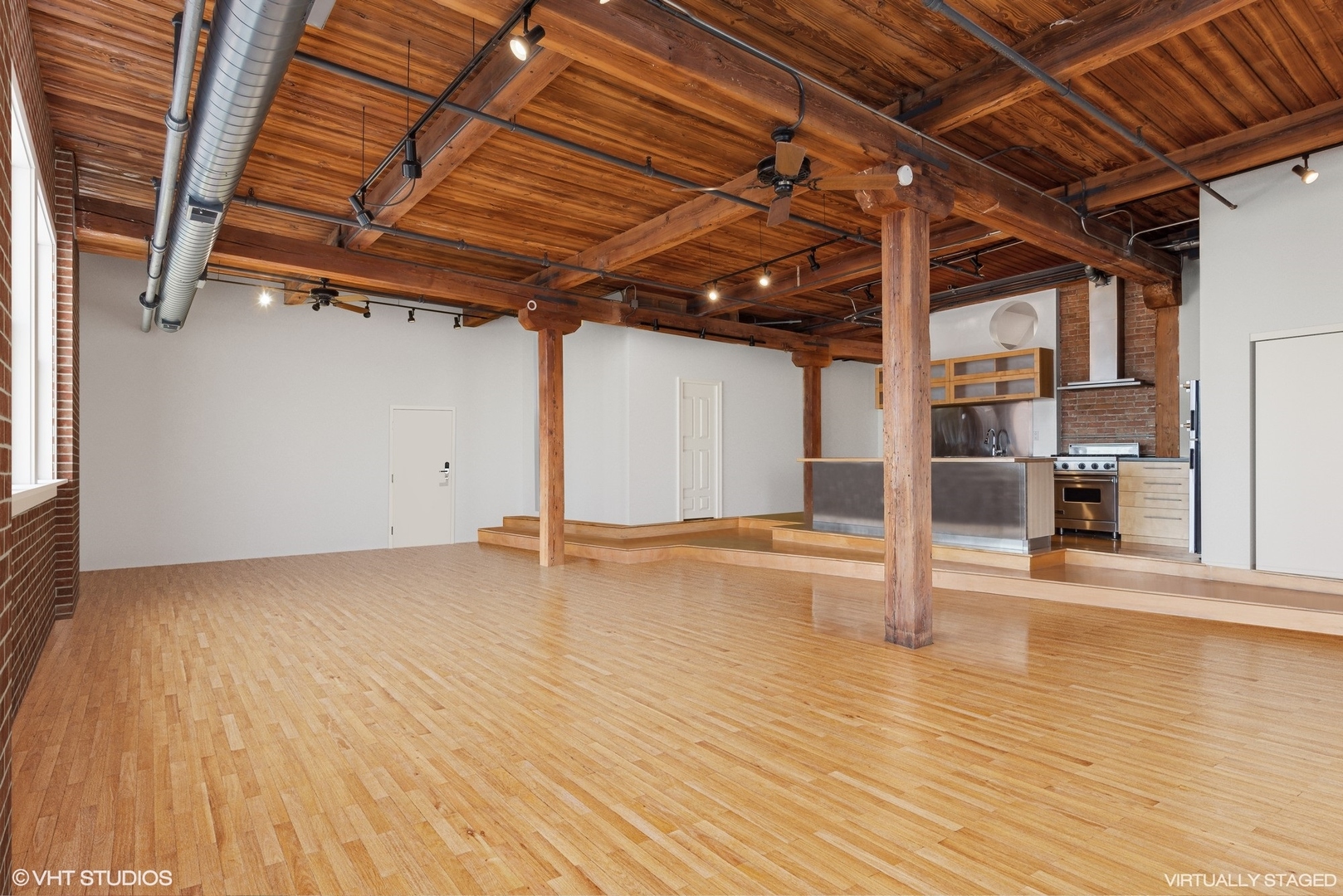 411 South Sangamon Street, Unit 8E Chicago, IL 60607 - Photo 3 of 25 an empty room with wooden floor