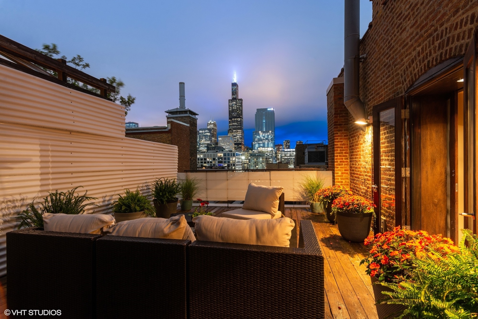 411 South Sangamon Street, Unit 8E Chicago, IL 60607 - Photo 6 of 25 a terrace of a house with outdoor seating