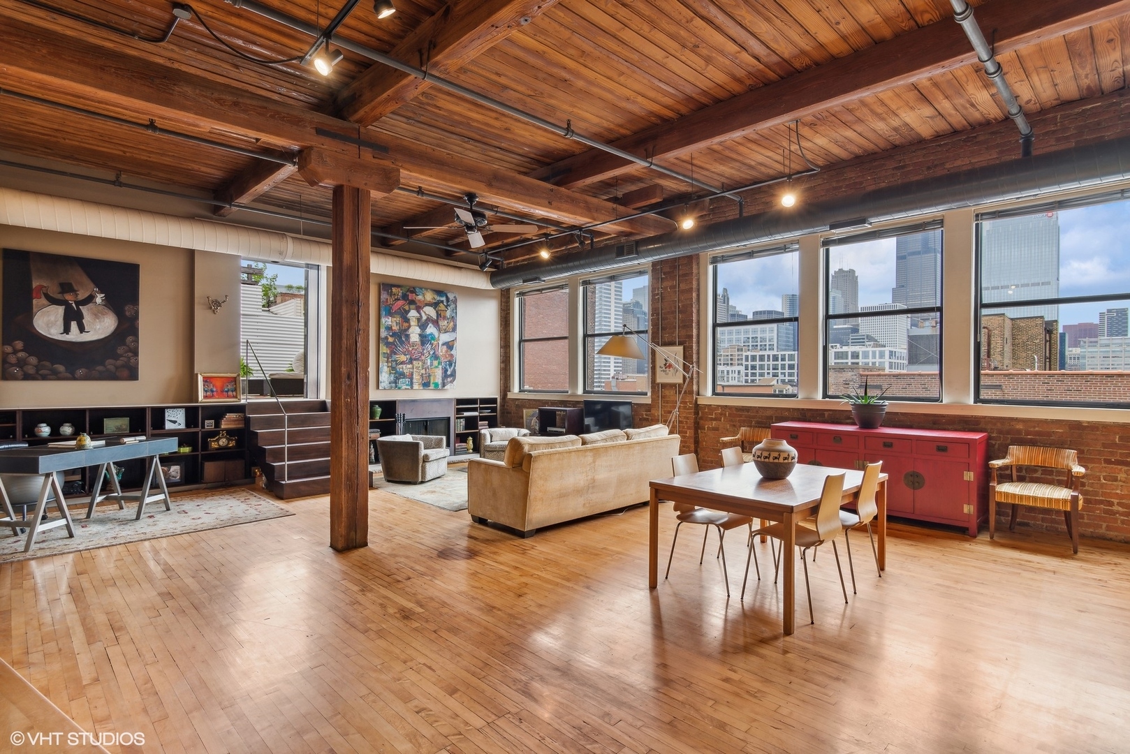 411 South Sangamon Street, Unit 8E Chicago, IL 60607 - Photo 8 of 25 a living room with furniture and wooden floor