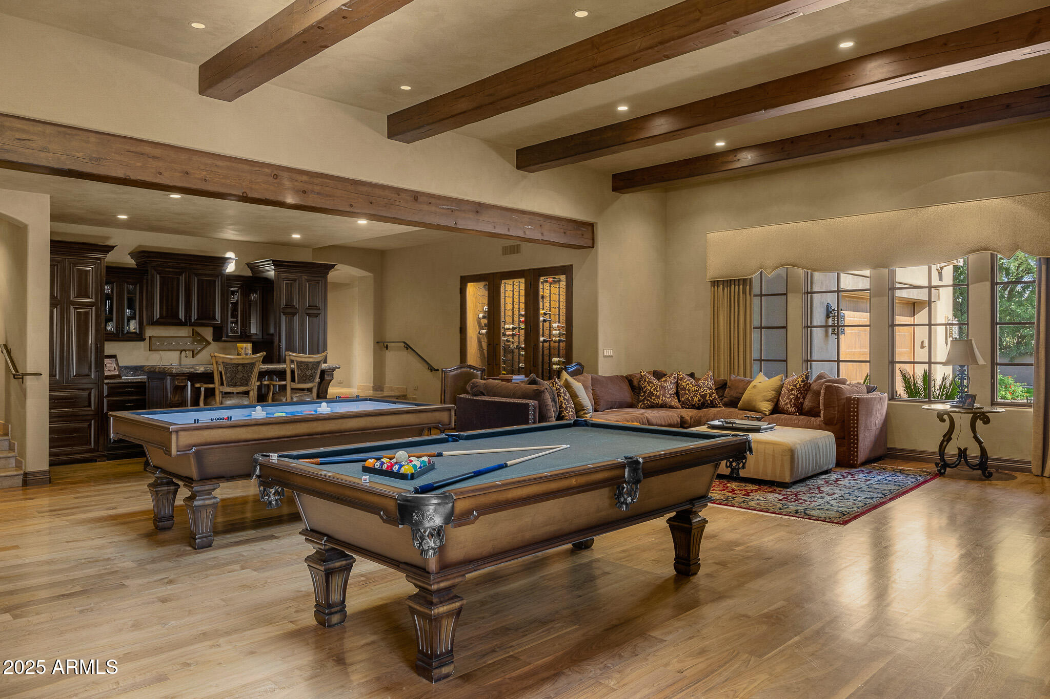 6000 North Palo Cristi Road Paradise Valley, AZ 85253 - Photo 12 of 62 a living room with furniture pool table and a wooden floor