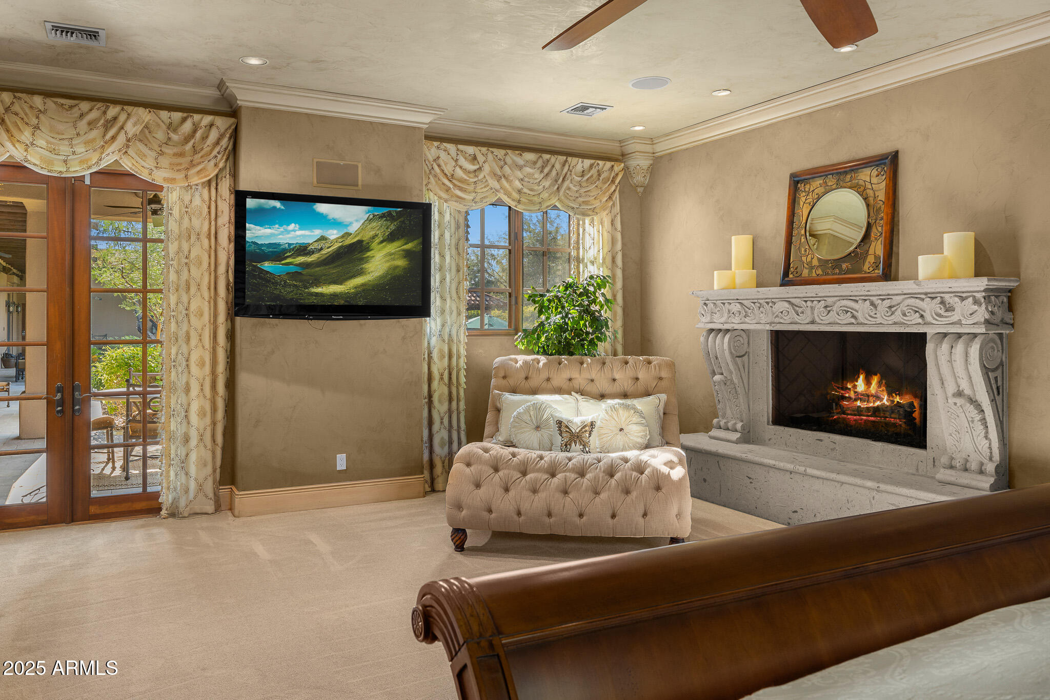 6000 North Palo Cristi Road Paradise Valley, AZ 85253 - Photo 18 of 62 a living room with furniture and a flat screen tv