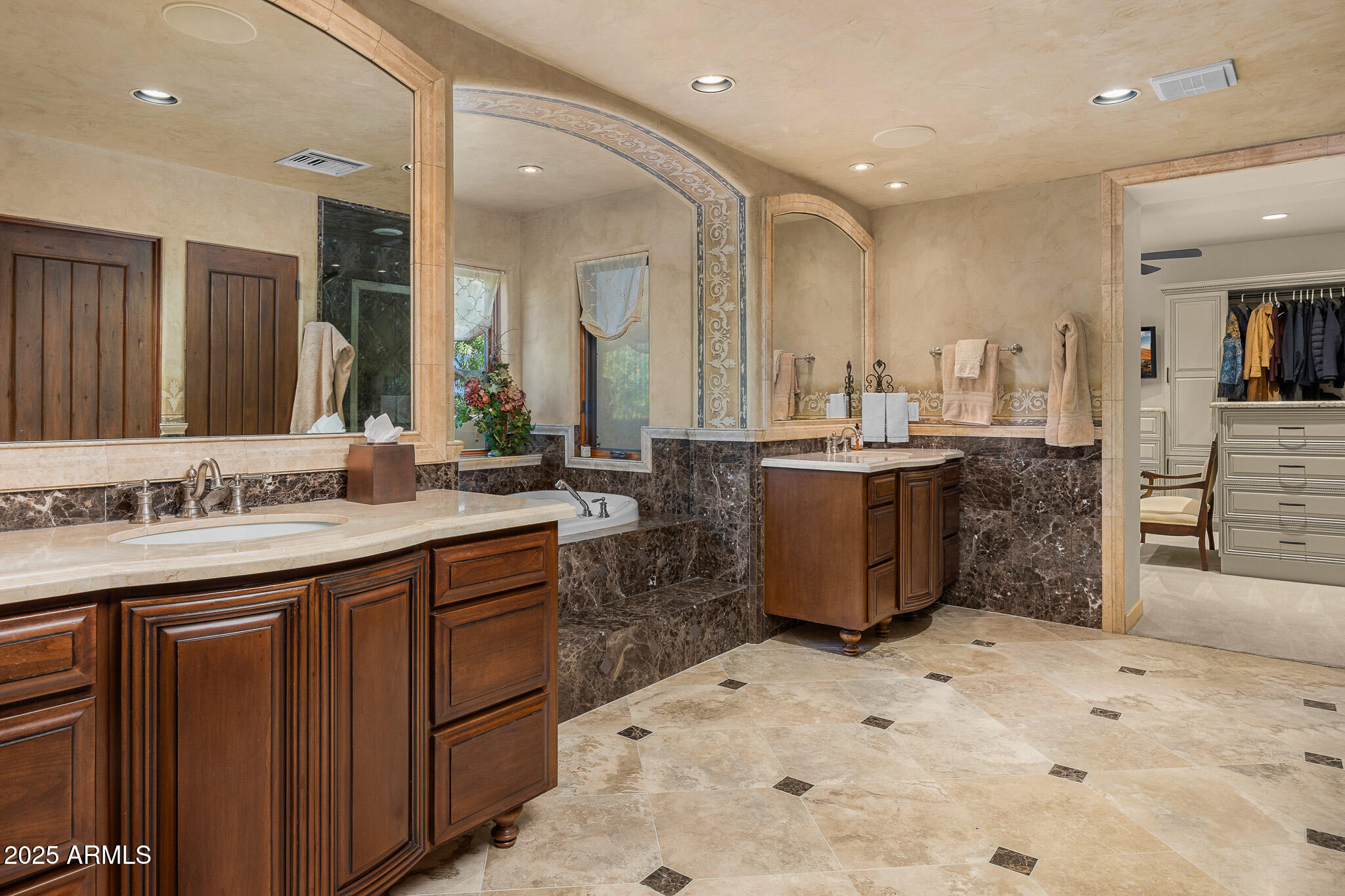 6000 North Palo Cristi Road Paradise Valley, AZ 85253 - Photo 20 of 62 a large kitchen with kitchen island a sink stainless steel appliances and cabinets