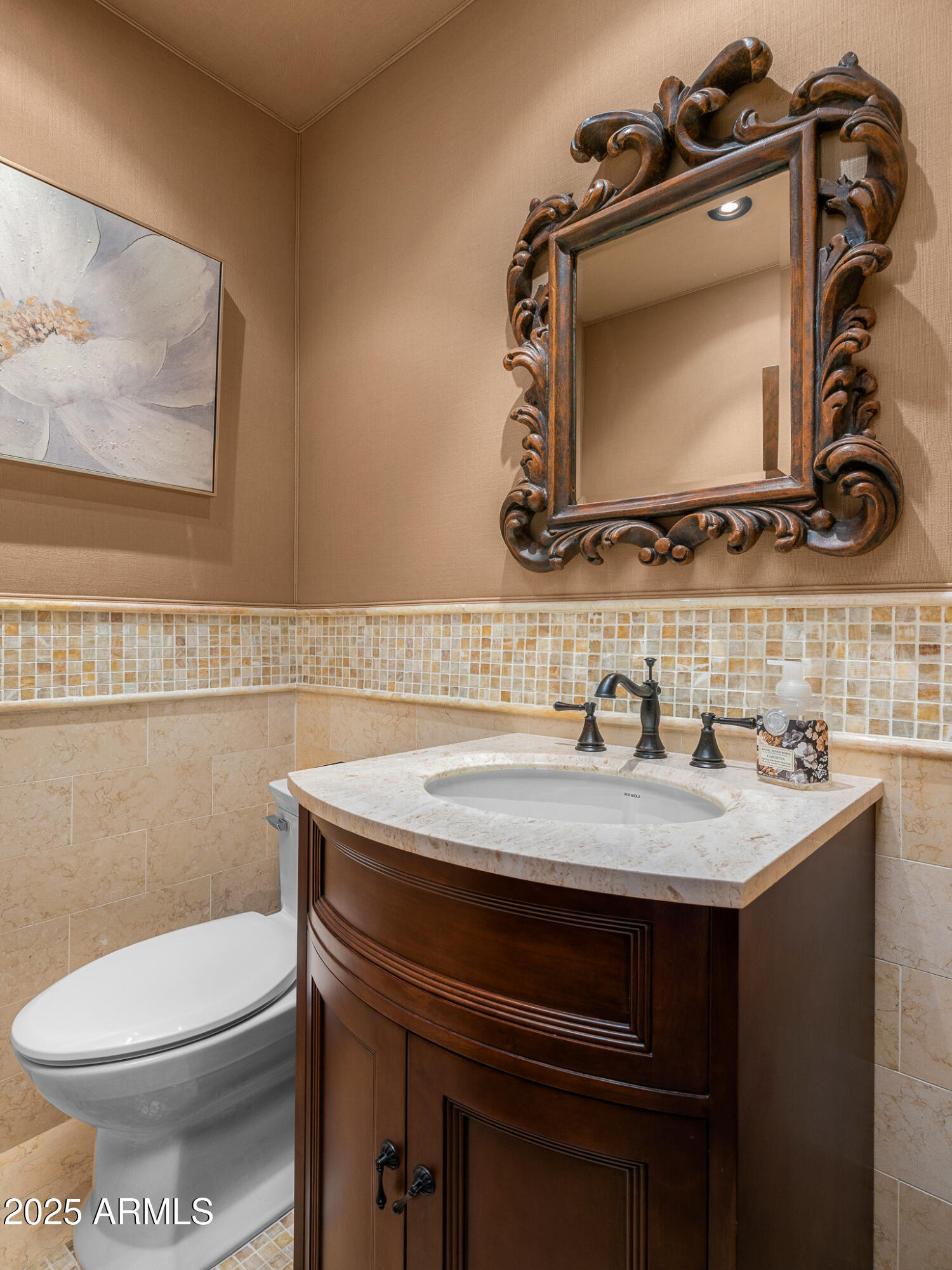 6000 North Palo Cristi Road Paradise Valley, AZ 85253 - Photo 22 of 62 a bathroom with a sink a toilet and a mirror