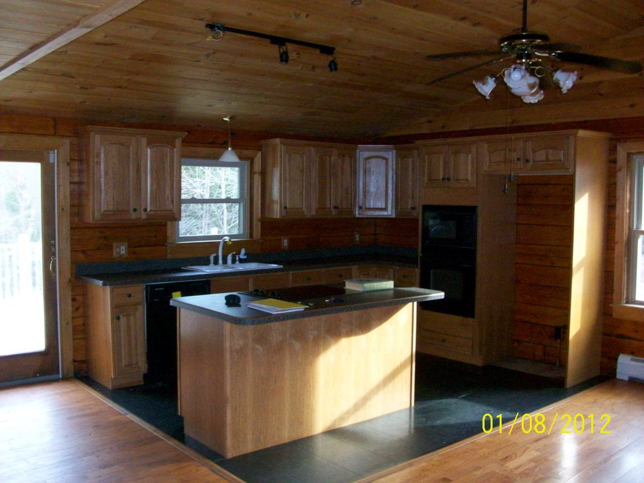819 Bonny Rigg Hill Road Becket, MA 01223 - Photo 2 of 7 a kitchen with a stove and a microwave