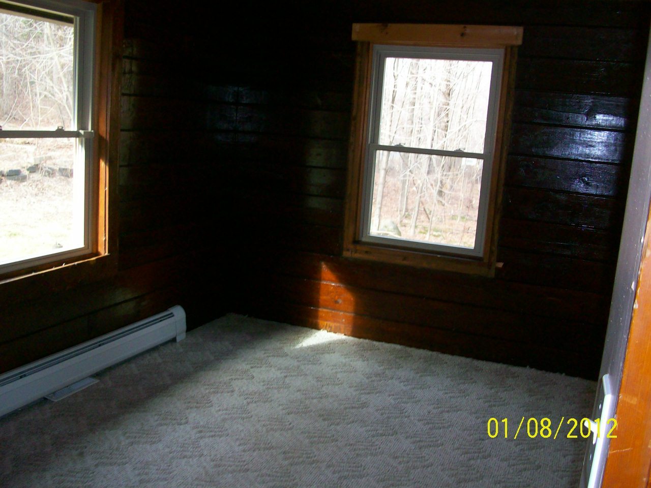 819 Bonny Rigg Hill Road Becket, MA 01223 - Photo 6 of 7 a room with a window and a ceiling fan