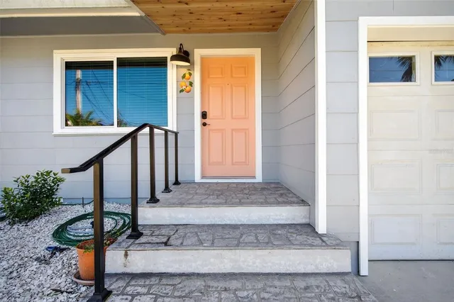 a kitchen with appliances cabinets and a window