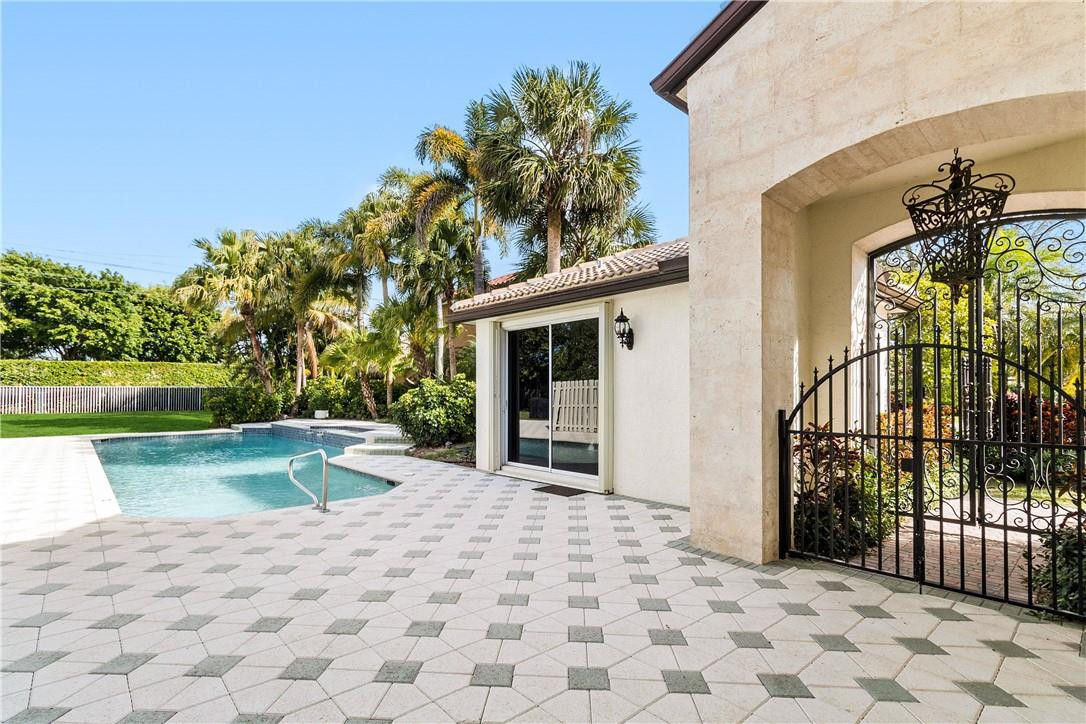 10945 Ravel Court Boca Raton, FL 33498 - Photo 3 of 24 a view of a house with a porch
