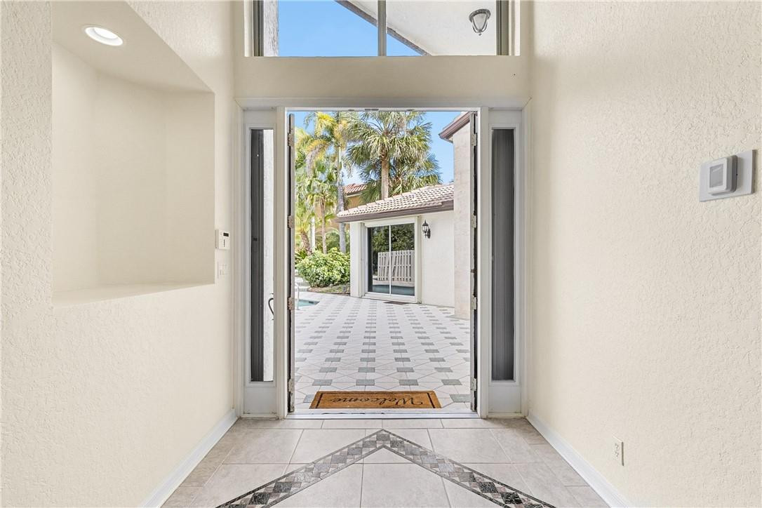 10945 Ravel Court Boca Raton, FL 33498 - Photo 6 of 24 view of the front door of house