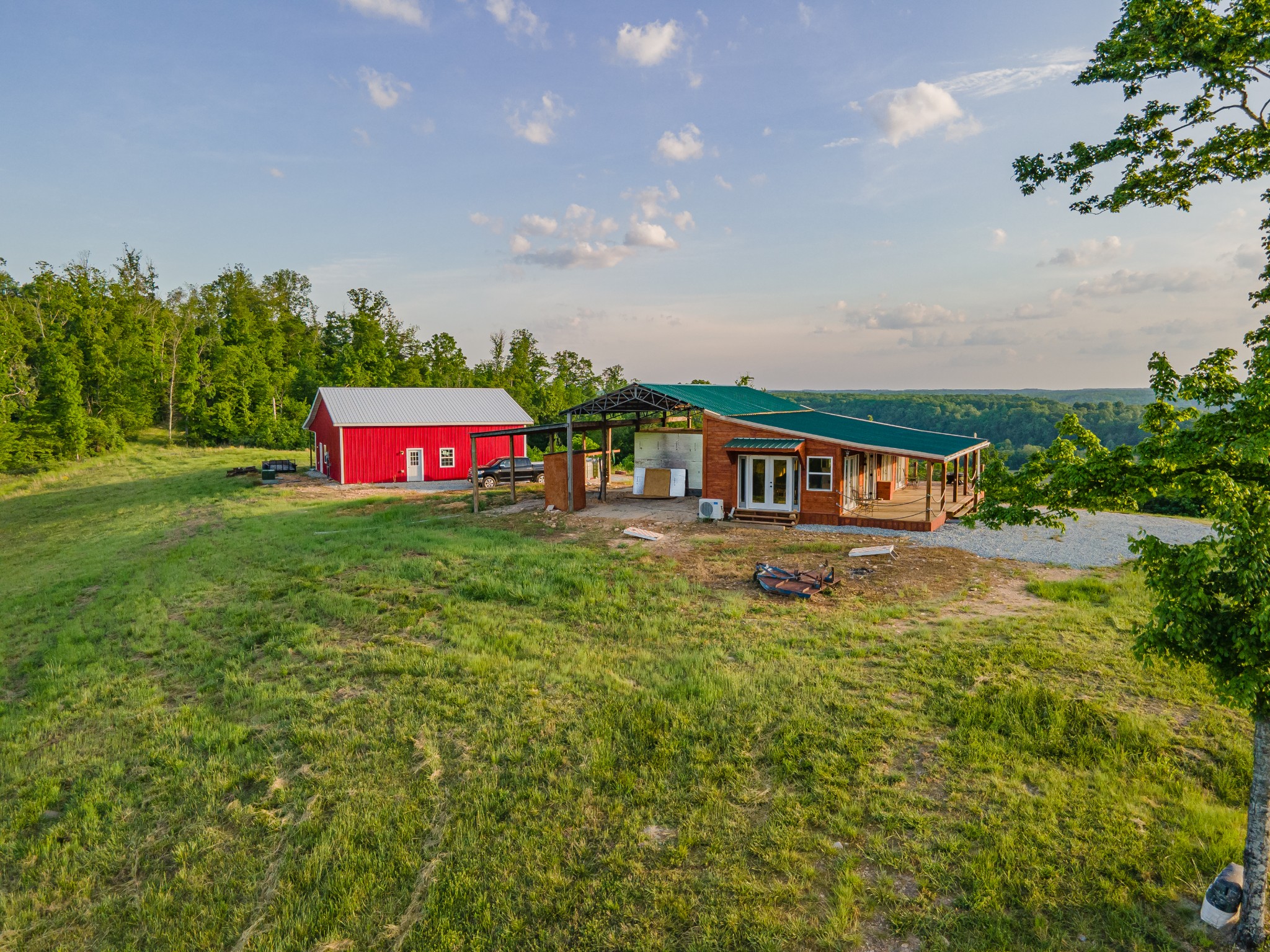 3383 Coble To Only Road Nunnelly, TN 37137 - Photo 61 of 75 a view of a house with a big yard potted plants and large tree