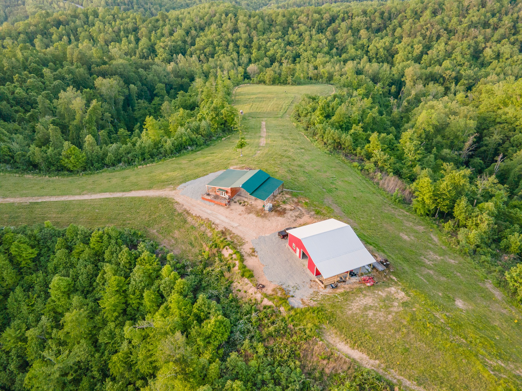 3383 Coble To Only Road Nunnelly, TN 37137 - Photo 9 of 75 a view of a backyard with fountain and potted plants