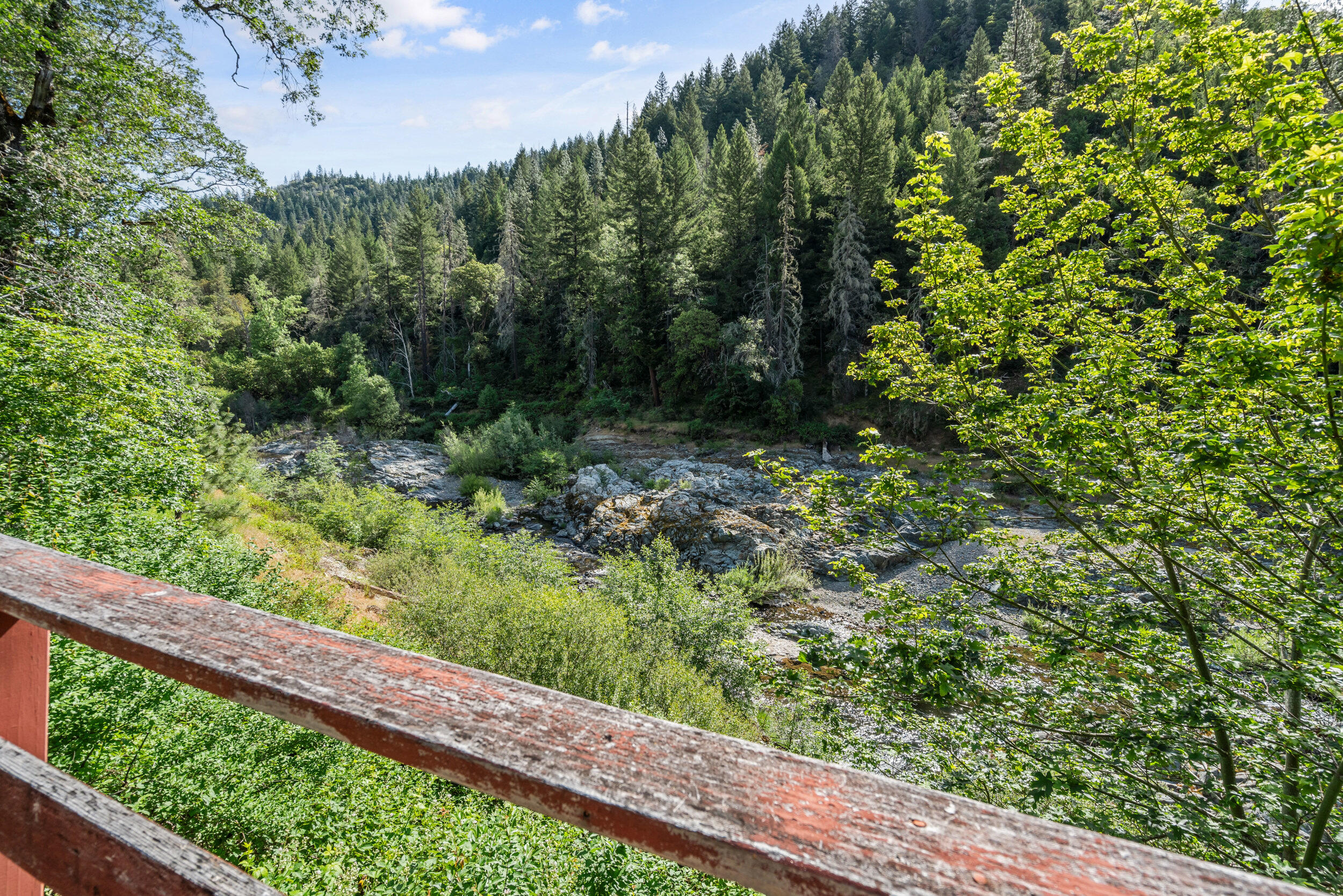 3300 West Evans Creek Road Rogue River, OR 97537 - Photo 19 of 21 a view of a yard with a wooden fence