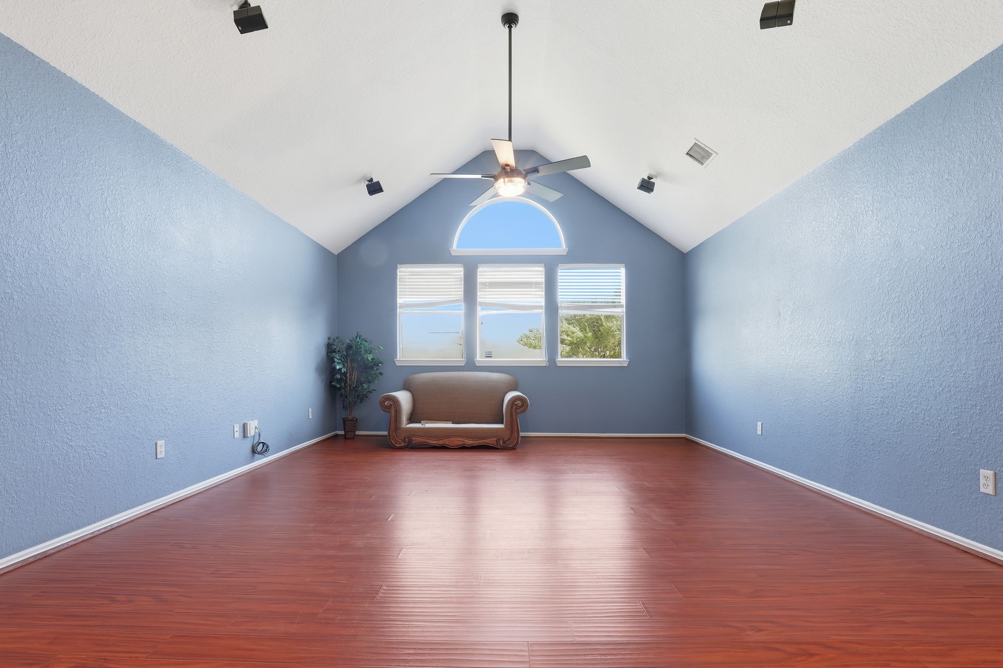 8202 Terrace Brook Drive Houston, TX 77040 - Photo 4 of 23 Discover the perfect game room oasis with vaulted ceilings and ample natural light, ideal for entertainment and relaxation