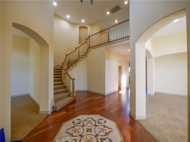 a view of entryway with wooden floor