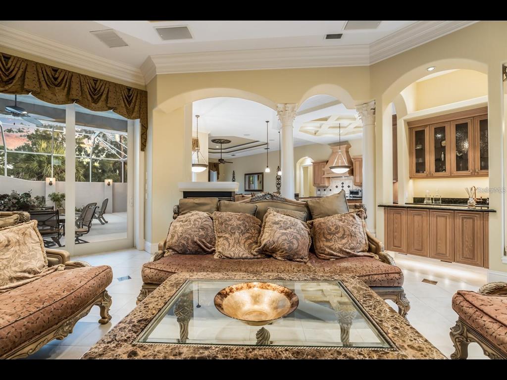 1102 Horizon View Drive Sarasota, FL 34242 - Photo 15 of 56 a living room with furniture and a large window