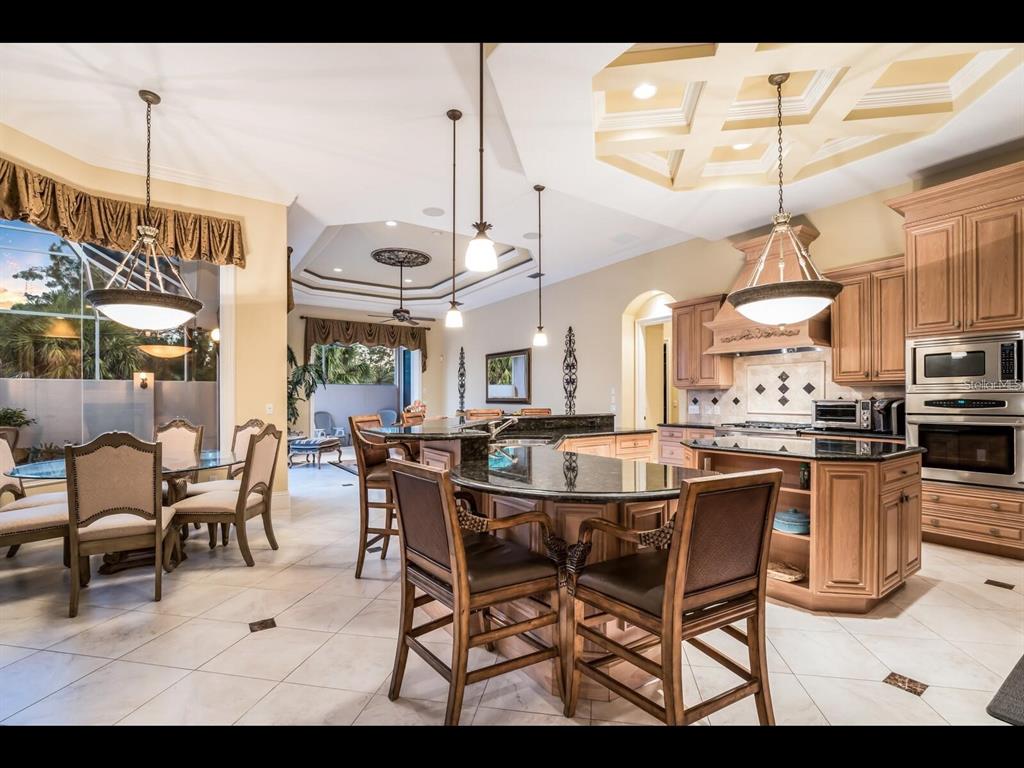 1102 Horizon View Drive Sarasota, FL 34242 - Photo 18 of 56 a view of a dining area with furniture