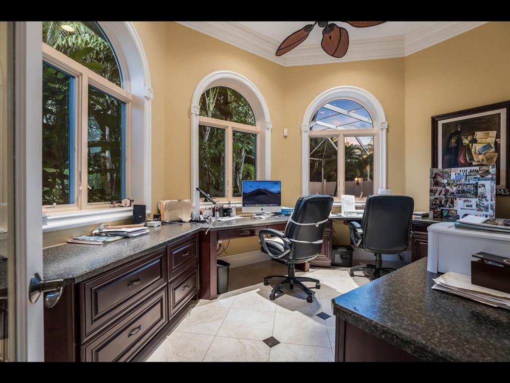 1102 Horizon View Drive Sarasota, FL 34242 - Photo 29 of 56 a view of a livingroom with workspace and a window