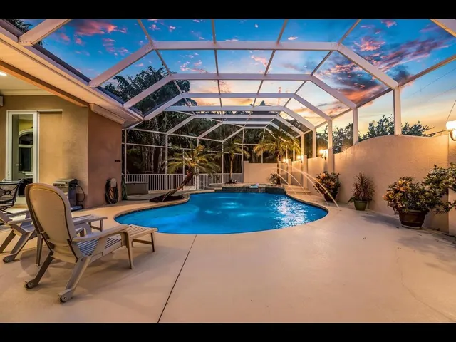 a view of a couches with wooden floor