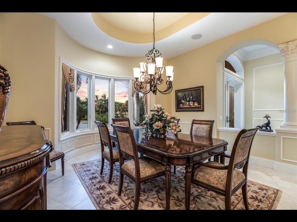 1102 Horizon View Drive Sarasota, FL 34242 - Photo 5 of 56 a view of a dining room with furniture and window
