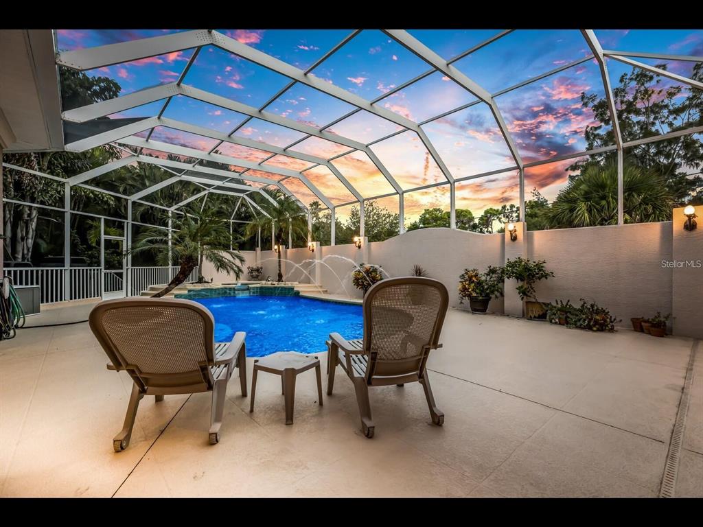 1102 Horizon View Drive Sarasota, FL 34242 - Photo 53 of 56 a view of a chairs and table in a patio