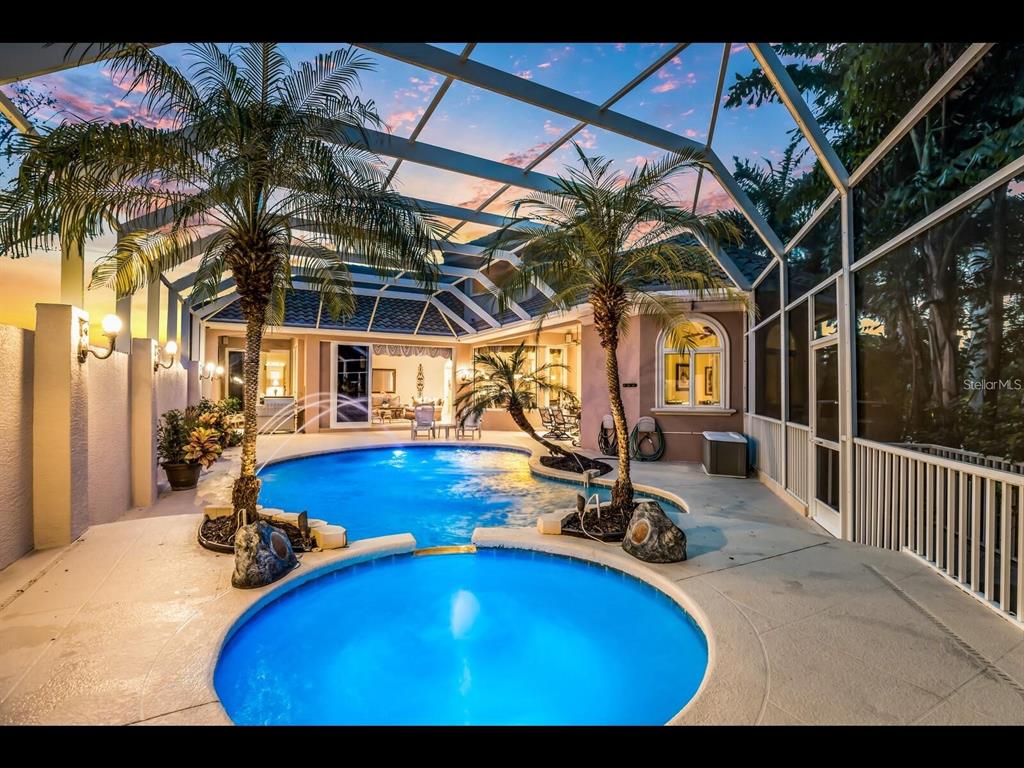 1102 Horizon View Drive Sarasota, FL 34242 - Photo 54 of 56 a view of a swimming pool with a patio and yard