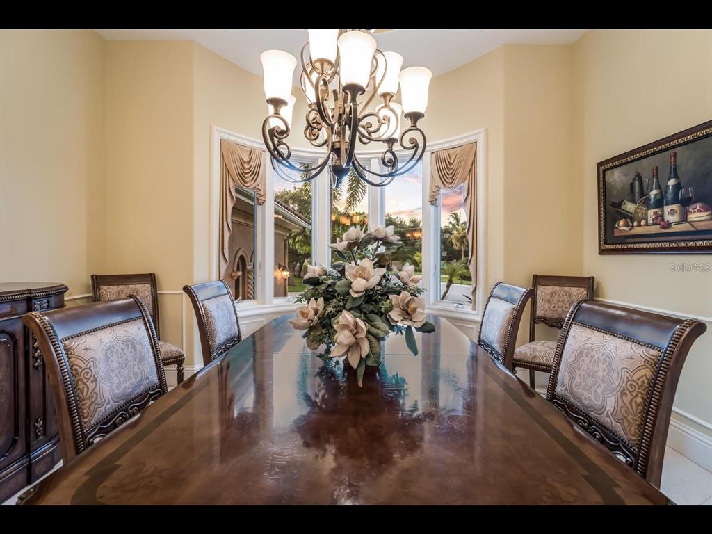 1102 Horizon View Drive Sarasota, FL 34242 - Photo 6 of 56 a view of a dining room with furniture window and wooden floor