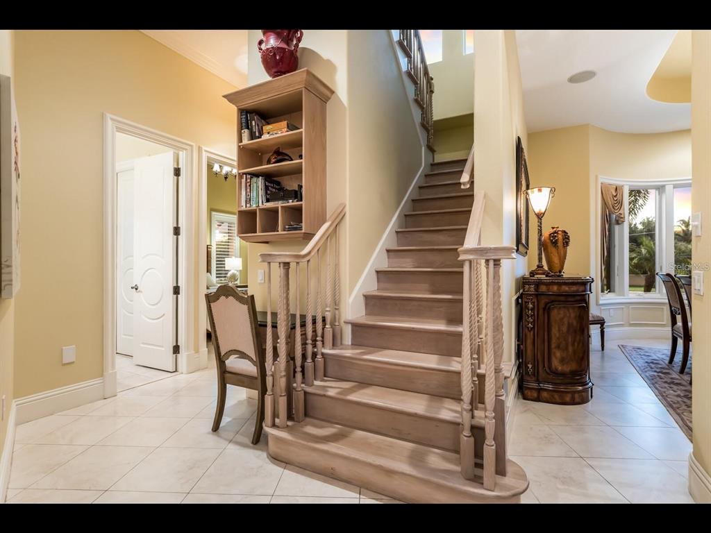 1102 Horizon View Drive Sarasota, FL 34242 - Photo 8 of 56 a view of entryway and hall with wooden floor