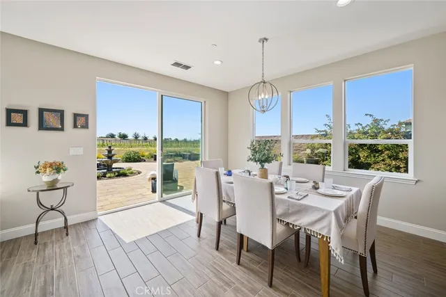 a view of a swimming pool and lounge chair