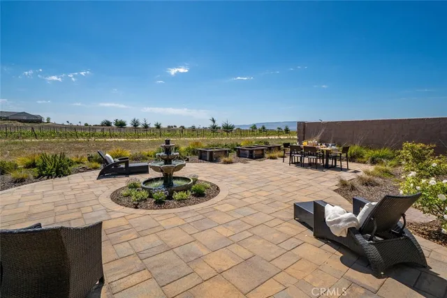 a view of a terrace with furniture