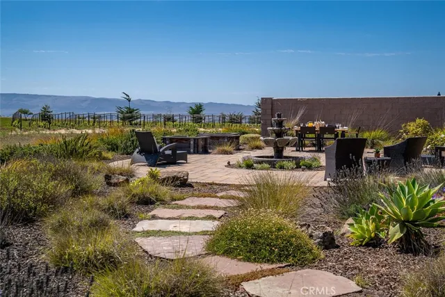 a spacious bedroom with a bed and a table