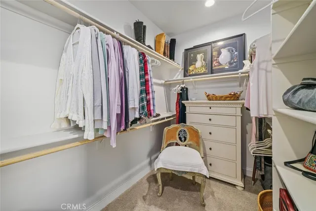 a utility room with sink dryer and washer