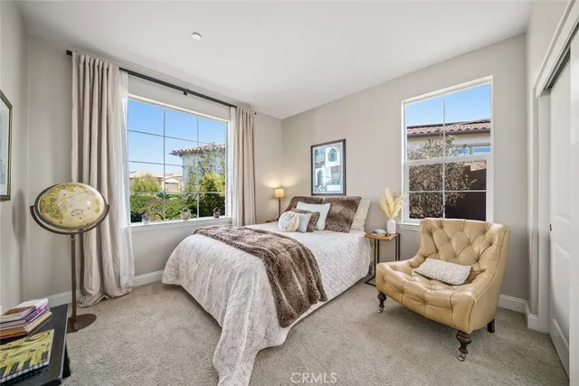 an aerial view of a house with a yard basket ball court and outdoor seating