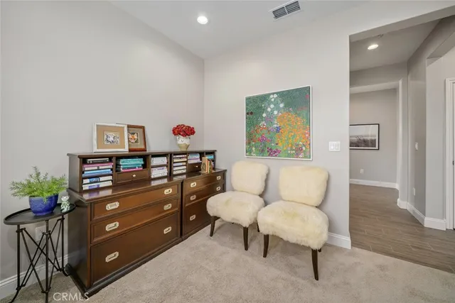 a view of a chairs and tables in the patio