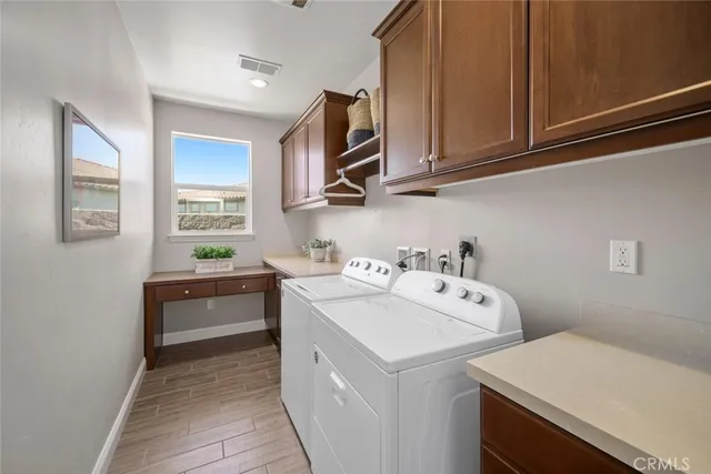 a view of a town with mountains in the background