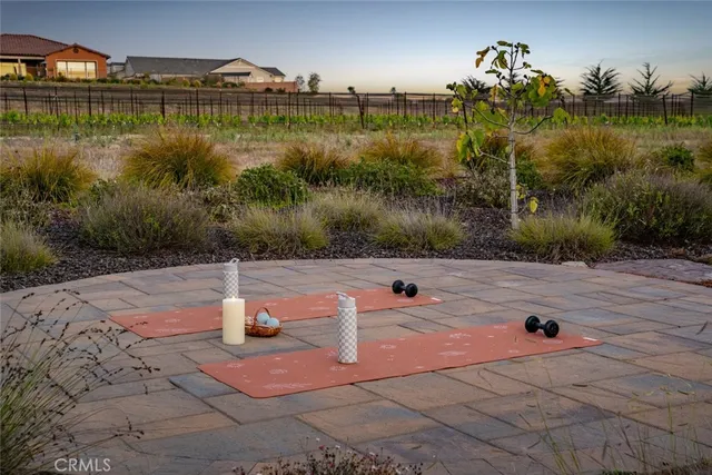 a view of a house with outdoor space and a lake view