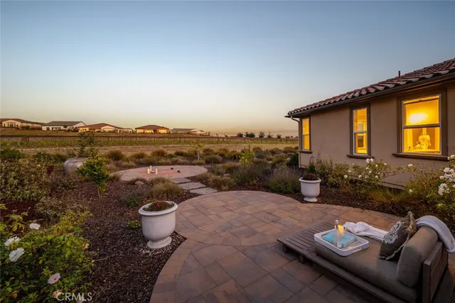 an aerial view of a house with a ocean view