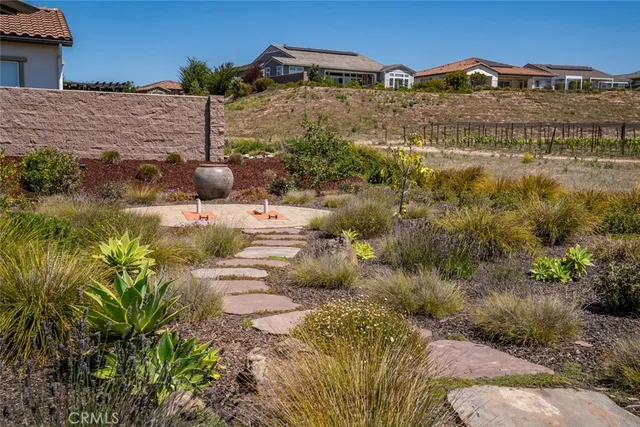 an aerial view of a house with swimming pool