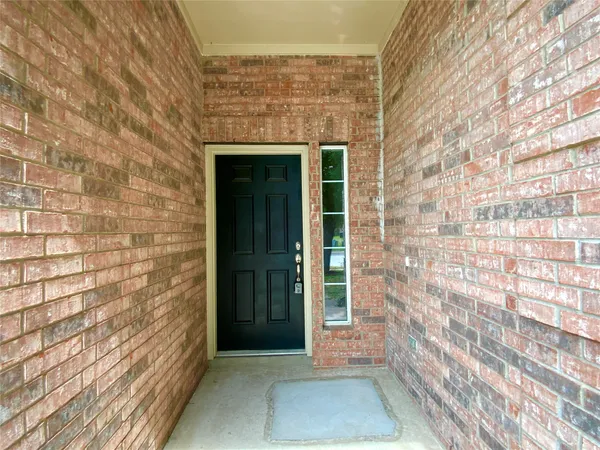 a view of front door of a house with an entrance